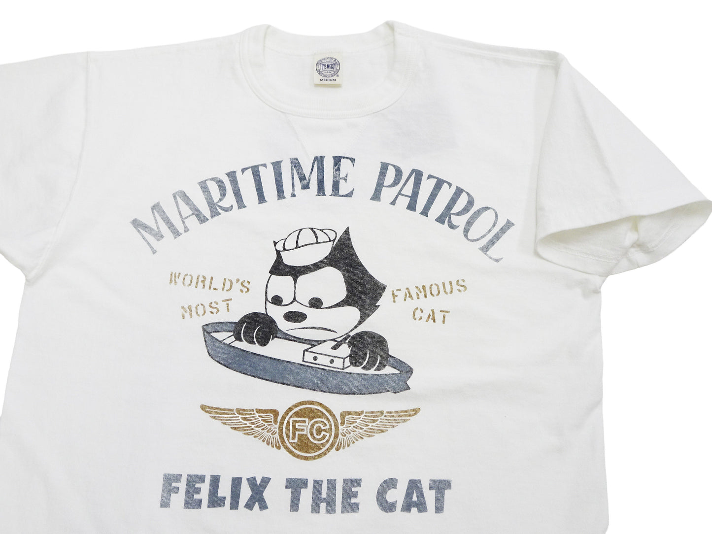 TOYS McCOY Men's Felix the Cat U.S. Navy Graphic Short Sleeve T-Shirt - Loopwheel Tubular Jersey, Garment Dyed, Made in Japan (TMC2601 011 Muted Off-White)